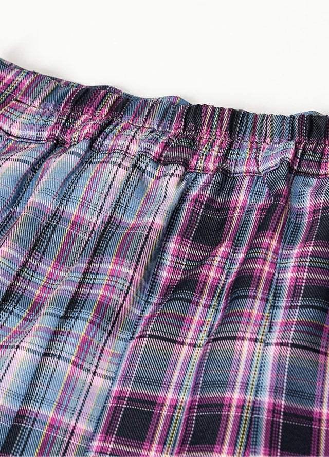 Detailed view of womens side button purple blue plaid mini pleated skirt elastic waist