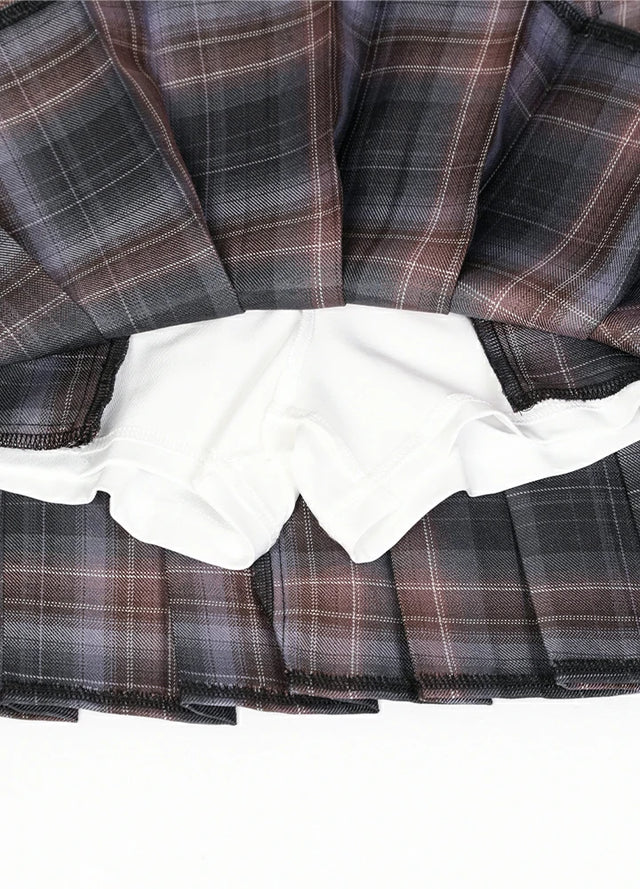 Zoomed-in view of the built-in elastic shorts on a women's gray pink plaid mini skirt