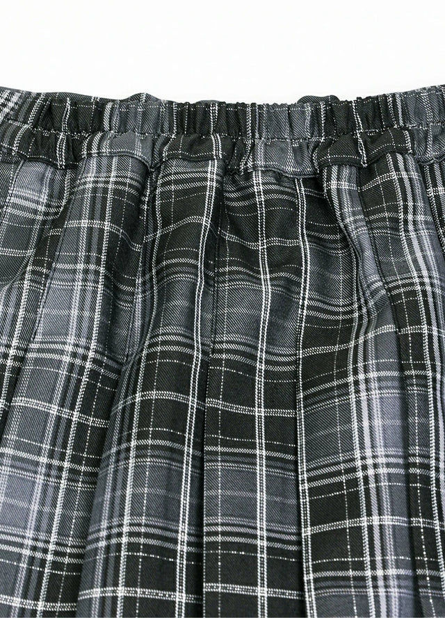 Detailed view of womens side button gray plaid mini pleated skirt elastic waist