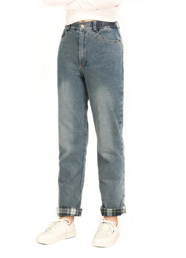 Women wearing a vintage blue flannel lined jeans
