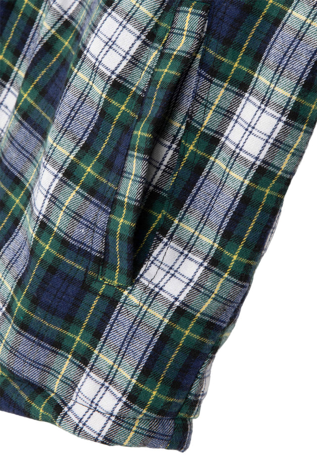 Close-up of women's green plaid sherpa lined flannel plaid hooded hand pocket