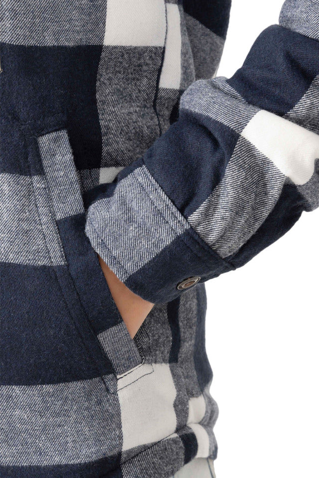 Close-up of womens buffalo navy white winter warm plaid jacket hand pocket