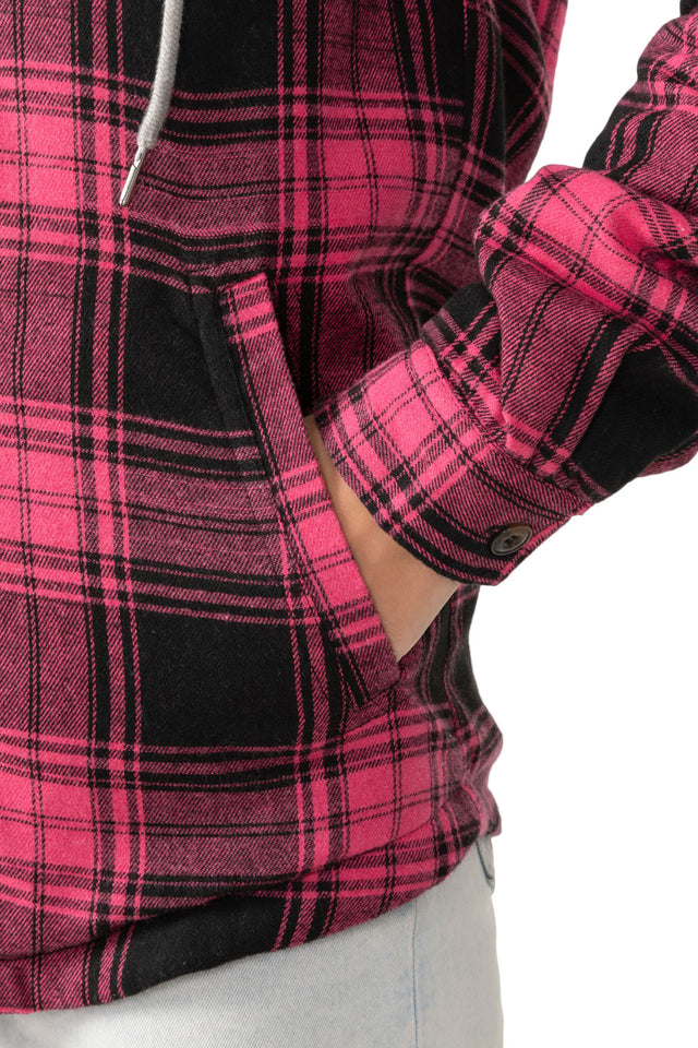 Close-up of womens pink sherpa lined flannel plaid hooded hand pocket