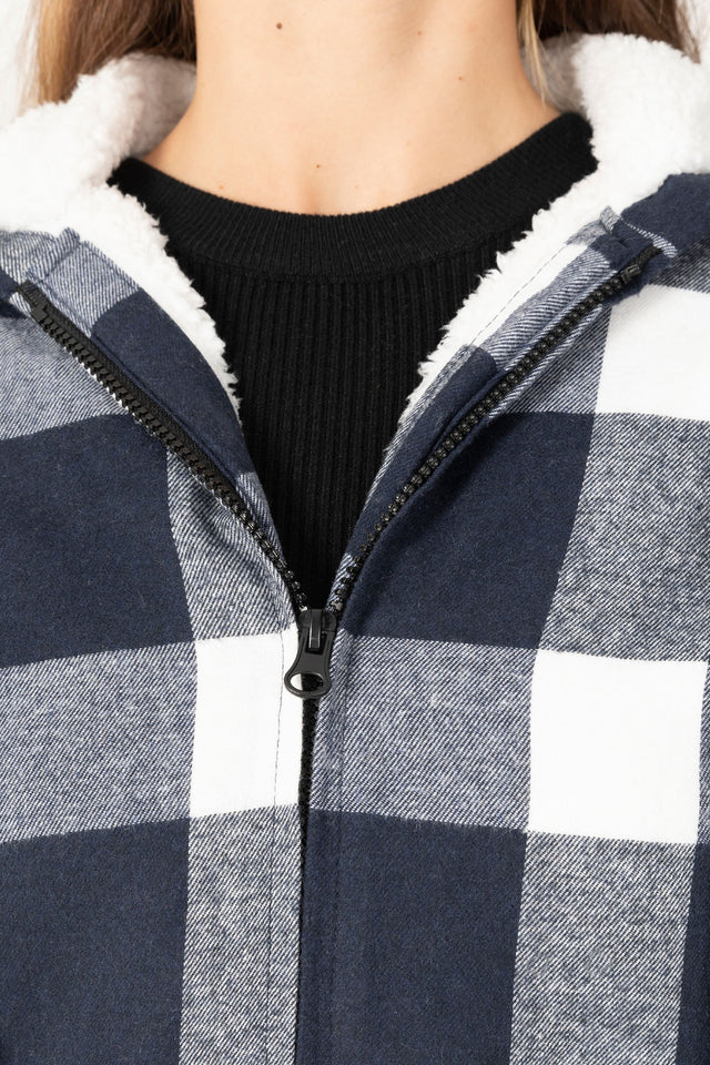 Detailed view of women's buffalo navy white sherpa lined hooded jacket zip