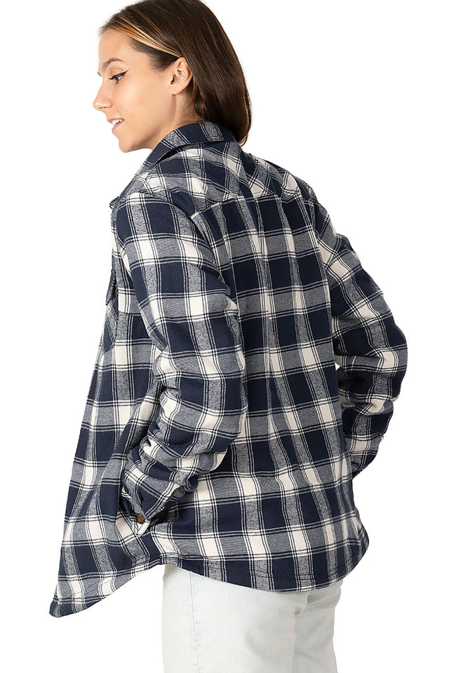 Women in a navy blue sherpa-lined flannel jacket back view