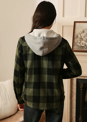 Back view of a woman in an army green fleece-lined plaid hooded shirt