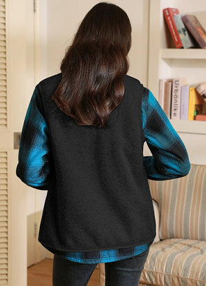 Back view of women in a black full-zip sherpa-lined fleece vest