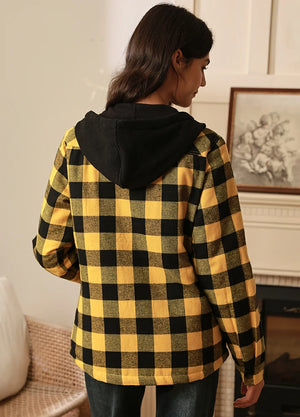 Back view of women in a warm yellow quilted-lined plaid jacket