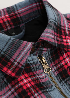 Close-up of women's winter long-sleeve pink blue flannel shacket collar