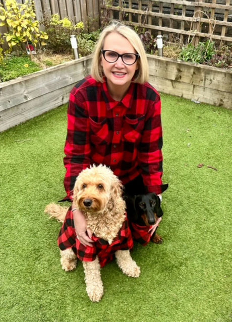 A woman and her dogs in our sozy flannel
