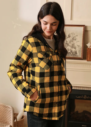 Side view of women in a winter yellow quilted lined flannel Hooded