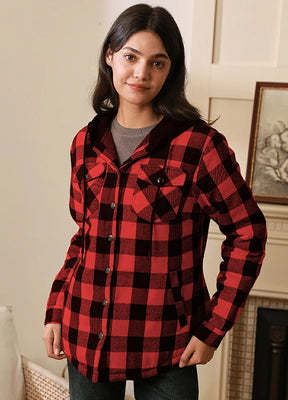 Women in a red black quilted lined plaid shirt jacket with hood
