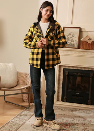 Women in a winter warm quilted lined flannel shacket with hood