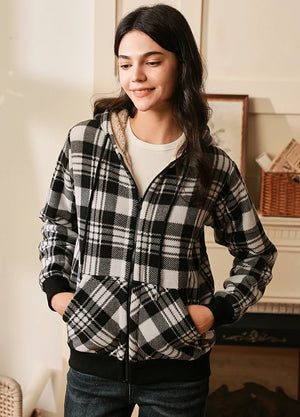 Women wearing a black full zip plaid hooded jacket with sherpa lined