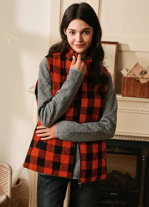 Women wearing a red black plaid winter zip up flannel vest