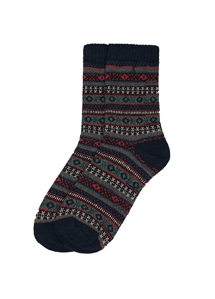 A pair of crew socks with a dark navy blue base and horizontal bands of red, green, and white geometric and floral patterns, shown against a plain white background.