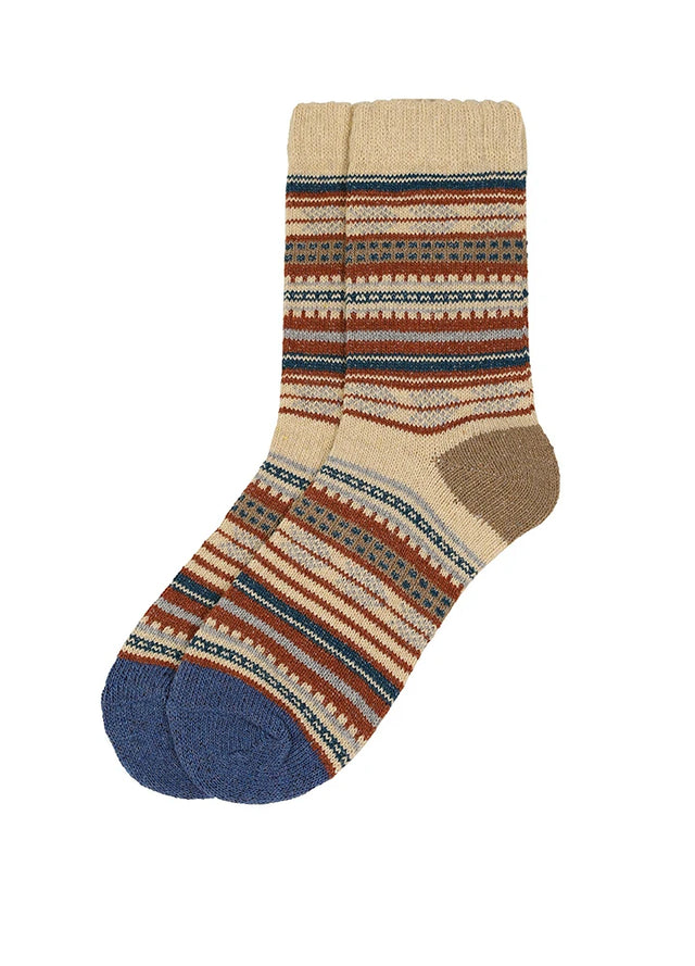 A pair of crew socks with a multicolor horizontal stripe pattern in beige, brown, blue, and orange, featuring solid blue toes and heels on a white background.