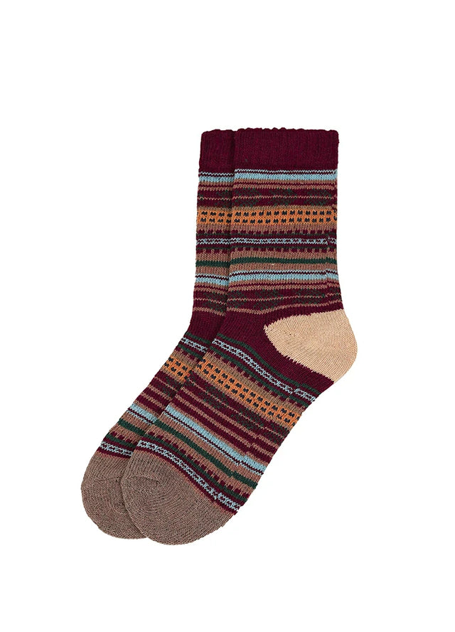 A pair of crew socks with a multicolor horizontal striped pattern featuring burgundy, beige, brown, orange, and light blue, shown on a plain white background.