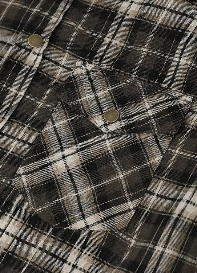 Close-up of a plaid button-up shirt fabric in black, white, and gray with two visible metal buttons-XR1302KAF-S,XR1302KAF-M,XR1302KAF-L,XR1302KAF-XL,XR1302KAF-XXL
