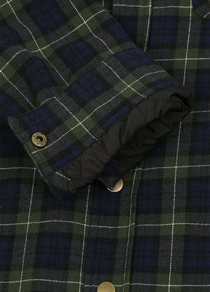 Close-up of a plaid button-front garment, likely a jacket or overshirt, with a dark navy and green tartan pattern, white grid lines, and a black quilted lining visible at the cuff-XR1302SGLL-S,XR1302SGLL-M,XR1302SGLL-L,XR1302SGLL-XL,XR1302SGLL-XXL