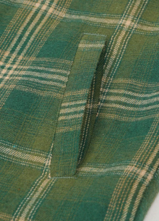 Close-up of the hand pocket of apple green men's winter zipper flannel jacket with fleece lining