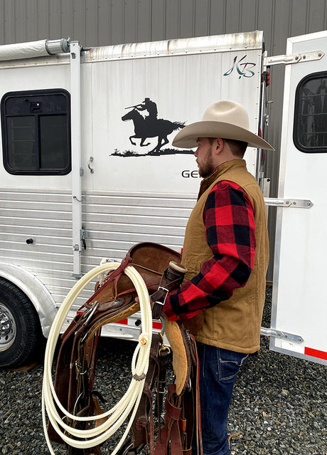 A busy cowboy in a dark coffee men's reversible fleece lined vest