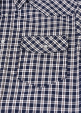 Close-up of pocket with button on kids starry night short-sleeve shirt