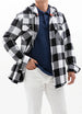 Man in a black white men's brushed heavyweight flannel hoodie
