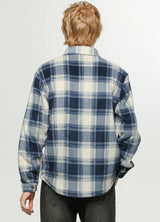Back view of a man wearing an ocean breeze tartan men's sherpa lined durable plaid jacket 