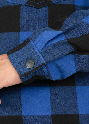 Close-up of the cuff of blue black men's sherpa lined flannel jacket with hood