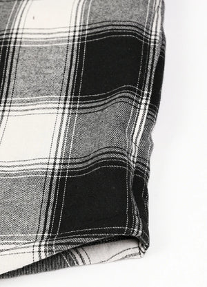 Close-up of the seam pocket of men's white black cozy sherpa lined hooded jacket 