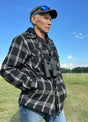 Front view of a man in a men's thicken plaid hooded flannel shirt jacket