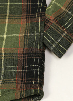 Close-up of the seam pocket of the green gray zip-up sherpa-lined plaid flannel jacket for men