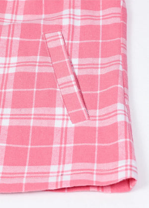 Close-up of the hand pocket on a women's full-zip pink flannel hoodie