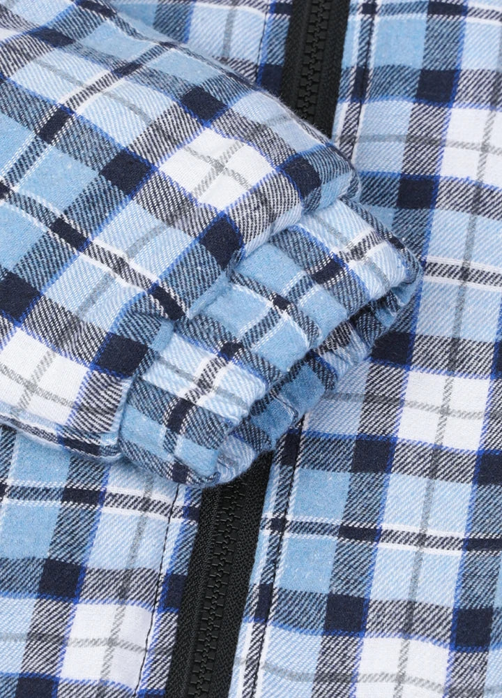 Close-up of elastic cuffs on kid's blue thermal flannel jacket