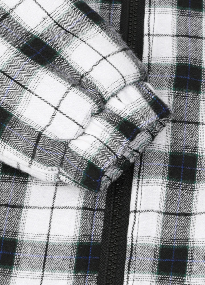 Close-up of elastic cuffs on kid's white thermal flannel jacket