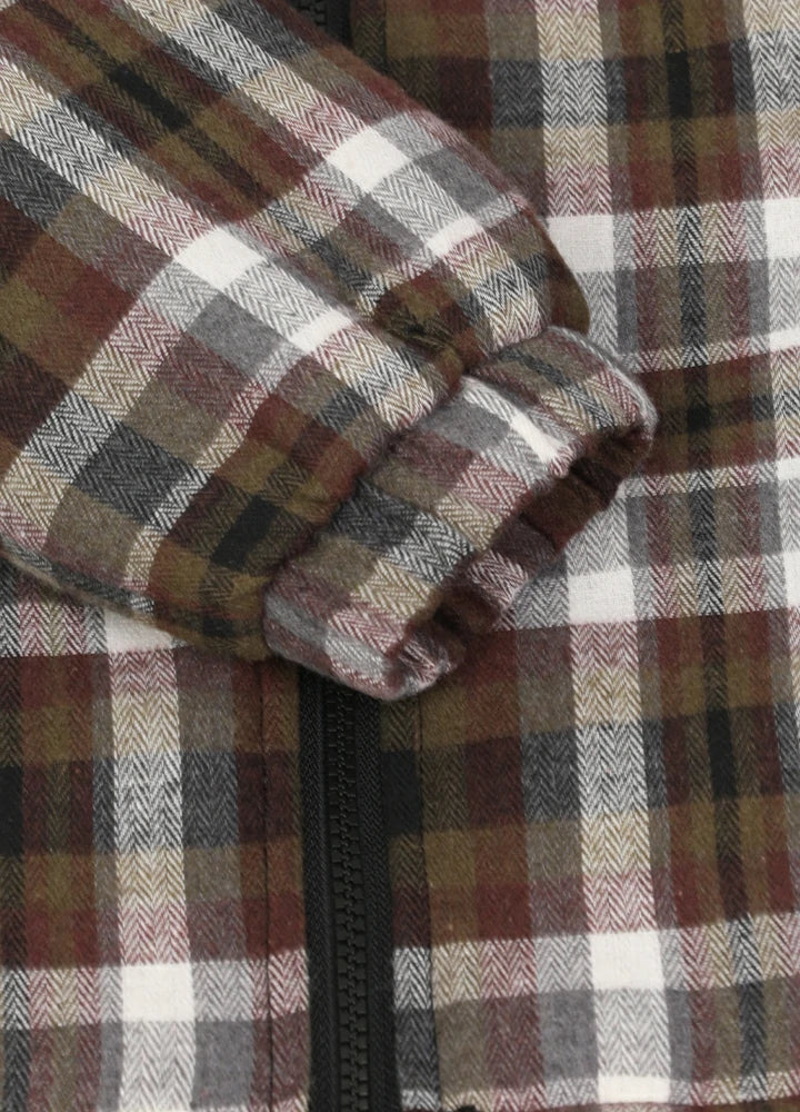 Close-up of elastic cuffs on kid's coffee thermal flannel jacket