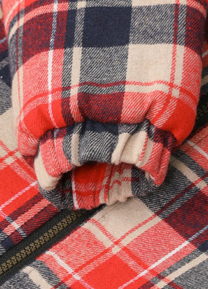 Close-up of elastic cuffs on kid's red thermal flannel jacket
