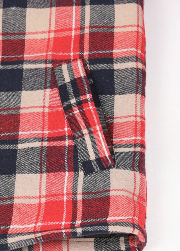 Close-up of two side pockets on kid's red thermal flannel jacket