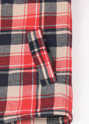Close-up of two side pockets on kid's red thermal flannel jacket