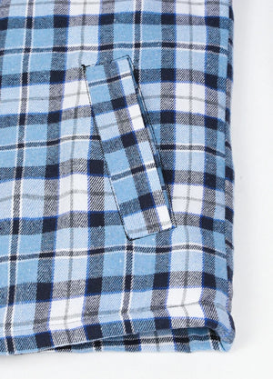 Close-up of two side pockets on kid's blue thermal flannel jacket