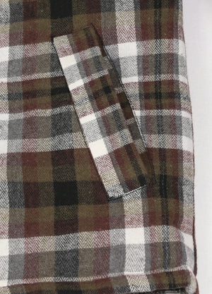 Close-up of two side pockets on kid's coffee thermal flannel jacket