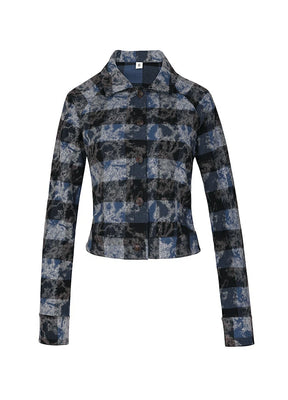 Front view of a women's cropped blue black washed plaid flannel shirt