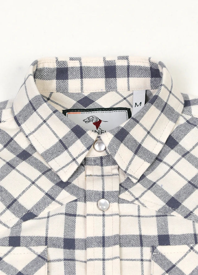 Detail of collar on kid's beige long-sleeve western shirt