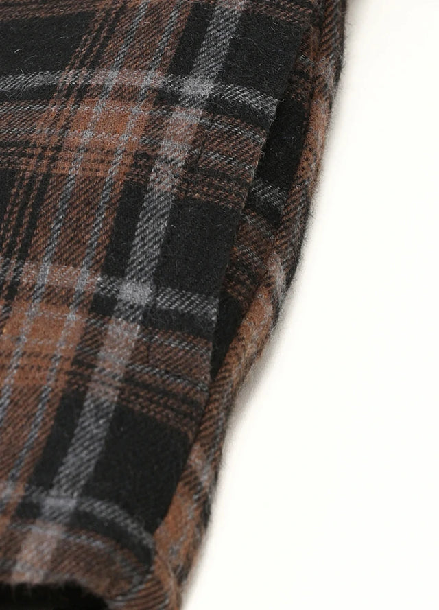 Detail of kid's chestnut insulated flannel jacket with hand pocket