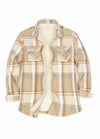 Front view of a womens sherpa-lined cream plaid fleece shirt jacket