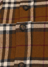 Close-up of the button of brown midweight flannel shirt for men