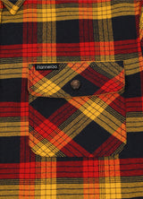 Close-up of the pocket of autumn leaf red men's midweight plaid flannel shirt