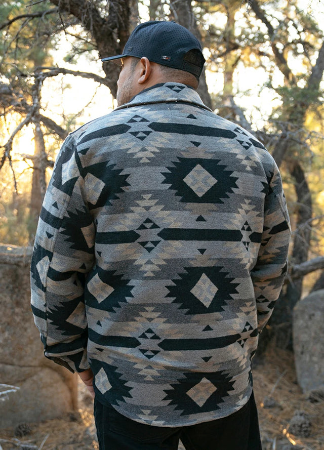 Back view of a man wearing a men's Aztec shirt jacket