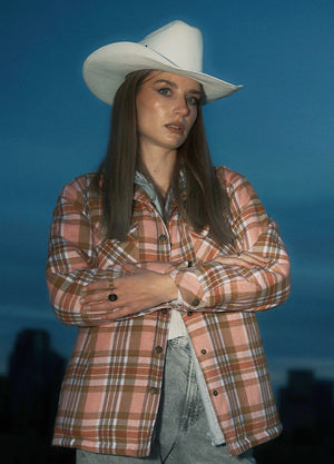 Lifestyle view of a woman wearing autumn peach women's full zip up quilted lined flannel jacket snap button closure-XR1135AP-S,XR1135AP-M,XR1135AP-L,XR1135AP-XL,XR1135AP-XXL